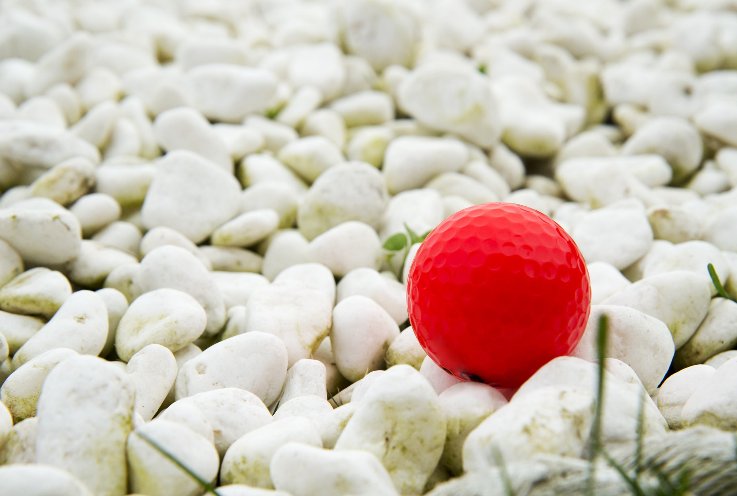 golf ball on gravel National Club Golfer